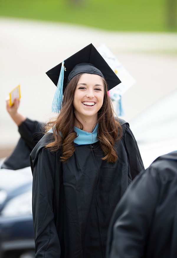 Lakeland University graduate in cap and gown.