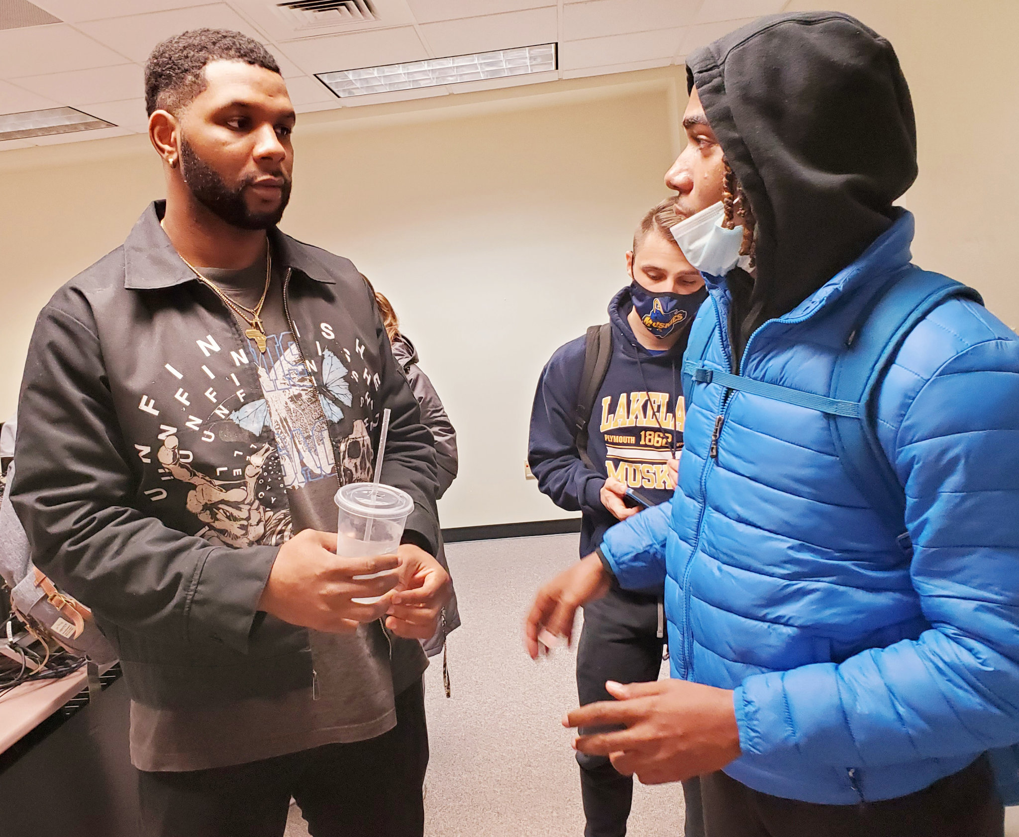 2016 grad shares success story with students